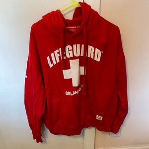 Red “Lifeguard” hoodie. Women’s size XL